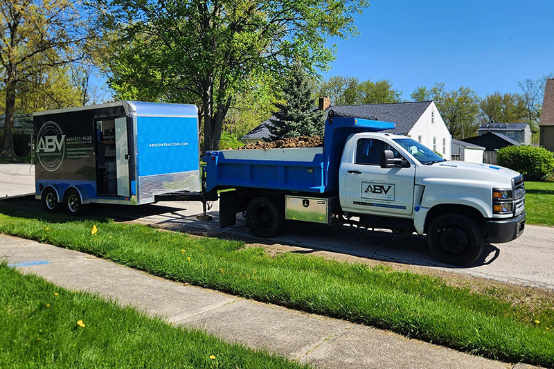 Exterior Basement Waterproofing Right Side View Truck Trailer - ABV Contractors